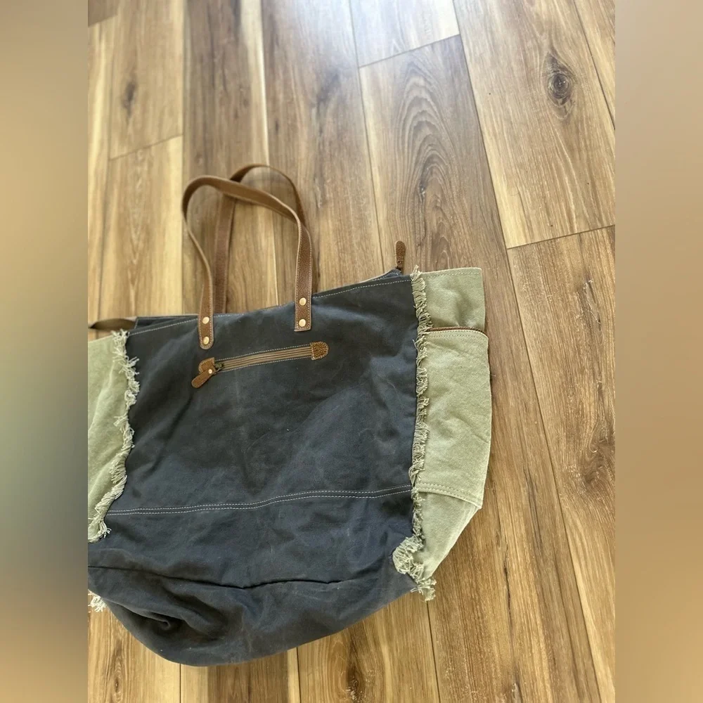 Myra Bag upcycled canvas & cowhide weekender bag